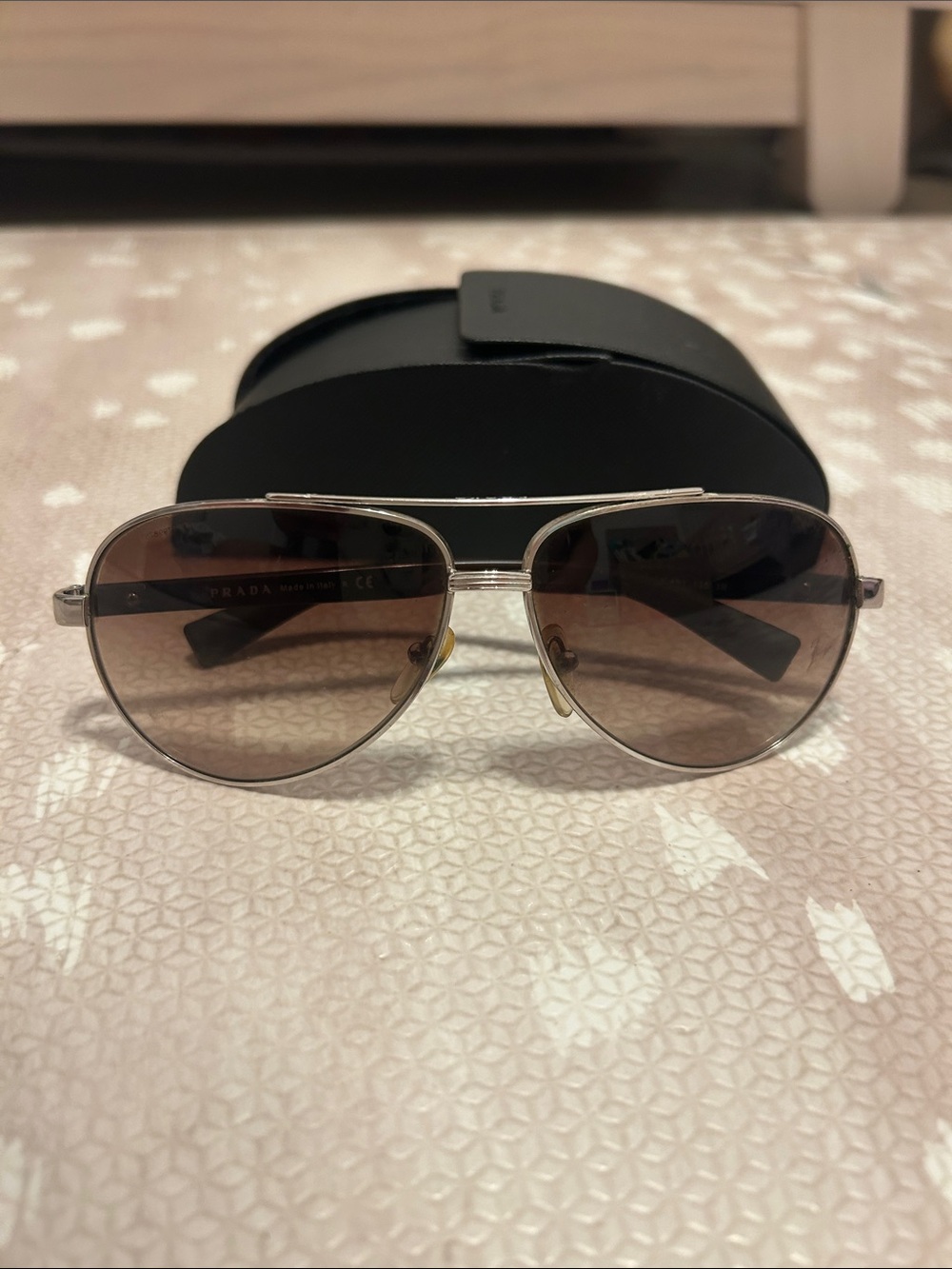 Prada Silver Frame Sunglasses with Brown Gradient Lenses